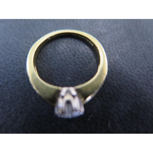 839 - An 18ct yellow gold and diamond ring - the central diamond approx 1/4ct flanked by fourteen smaller ... 