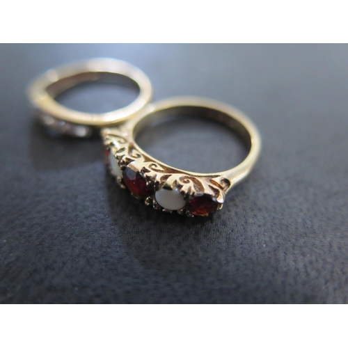 843 - A 9ct yellow gold garnet and opal ring size K - approx weight 2.4 grams and a 9ct yellow gold and cu... 