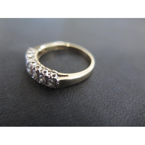 857 - A 9ct yellow gold seven stone diamond ring size R/S - approx weight 3.2 grams - all diamonds clean a... 