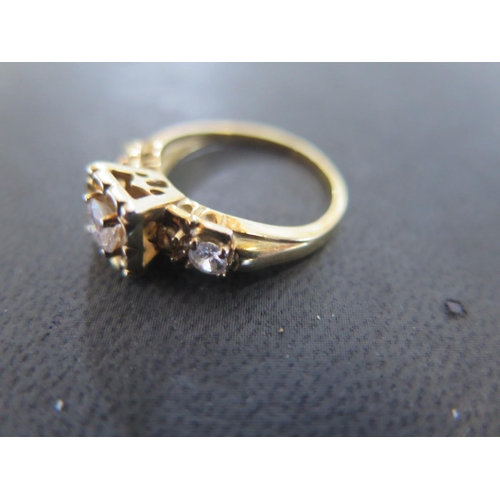 865 - A 14ct yellow gold three stone diamond ring size L - weight approx 3.8 grams - some light scratches,... 