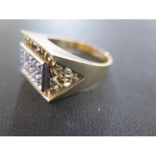 866 - A 14ct yellow gold and diamond six stone ring - the shoulder being set with six round cut diamonds -... 