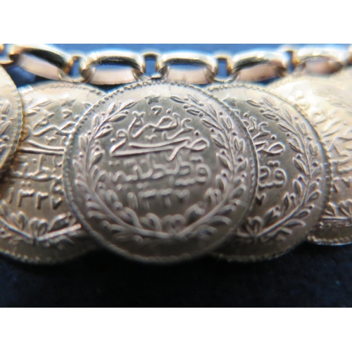 869 - A yellow gold necklace with 31 Turkish 100 Piastres of Abdul Hamid II coins all 22ct - approx weight... 