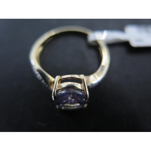 882 - A 9ct yellow gold ametrine and diamond ring size O - approx weight 2.7 grams - some light scratches ... 