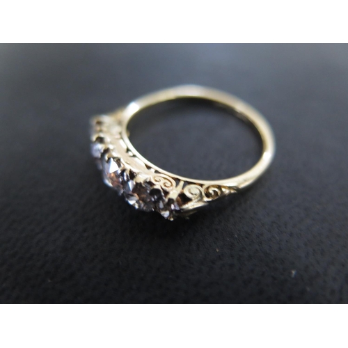 890 - An 18ct yellow gold five stone diamond ring size P - approx weight 3.3 grams - total diamond weight ... 