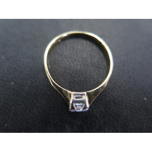 891 - An 18ct yellow gold solitaire ring size R - approx weight 2.3 grams - total diamond weight approx 0.... 