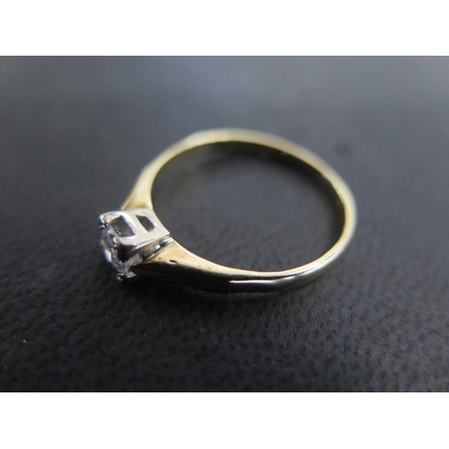 891 - An 18ct yellow gold solitaire ring size R - approx weight 2.3 grams - total diamond weight approx 0.... 