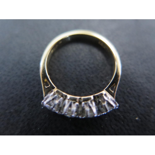 892 - An 18ct yellow gold four stone diamond ring size H/I - approx weight 2.9 grams - total diamond weigh... 