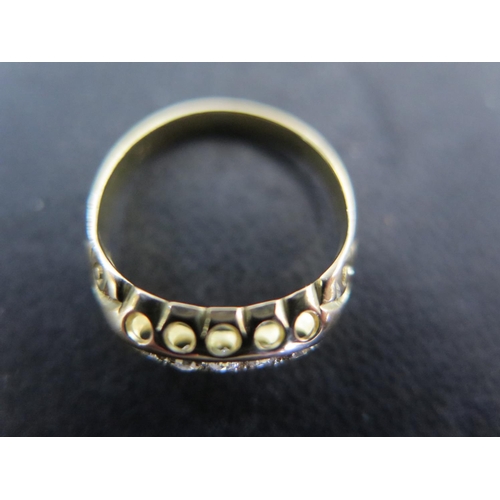 896 - An 18ct yellow gold five stone diamond ring size L - approx weight 2.4 grams - very light usage wear