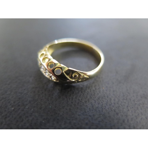 896 - An 18ct yellow gold five stone diamond ring size L - approx weight 2.4 grams - very light usage wear