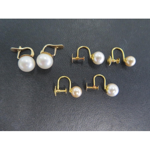 898 - Three pairs of pearl earrings, one pair stamped 9ct