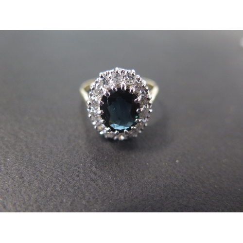 905 - An 18ct yellow gold Burmese sapphire and diamond ring - The central sapphire approx 7.5mm x 9mm x 3.... 