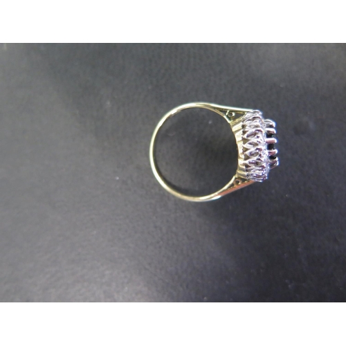 905 - An 18ct yellow gold Burmese sapphire and diamond ring - The central sapphire approx 7.5mm x 9mm x 3.... 