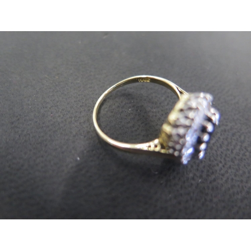 905 - An 18ct yellow gold Burmese sapphire and diamond ring - The central sapphire approx 7.5mm x 9mm x 3.... 