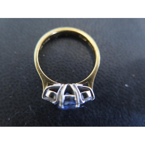 909 - An 18ct yellow gold sapphire and diamond ring size K - approx weight 3.1 grams - scratches and usage... 