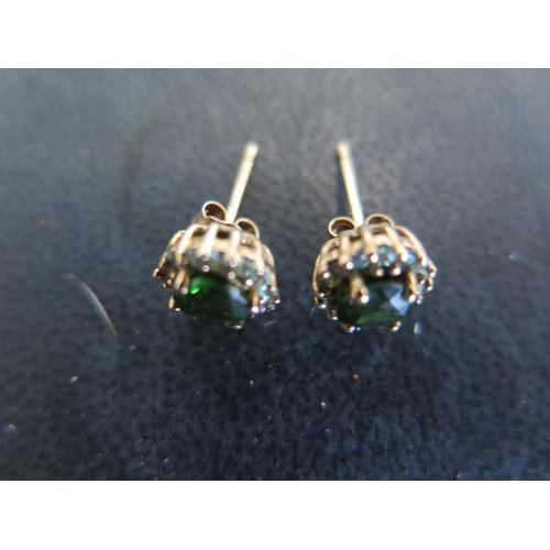 912 - A pair of 9ct gold chrome diopside and alexandrite set earrings - some very small surface abrasions