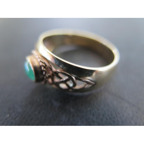 936 - A 9ct Welsh gold Clogau ring set with emerald - ring size X - approx weight 6.5 grams - some light s... 