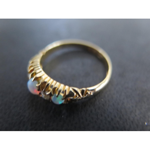 951 - An 18ct yellow gold opal and diamond ring size Q/R - approx weight 3.2 grams - some very light scrat... 