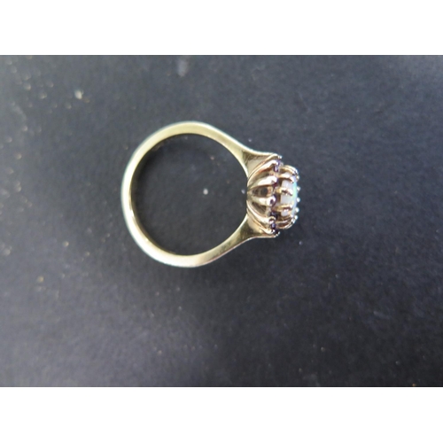 958 - A 9ct yellow gold opal ring size P - approx weight 3.5 grams - minor usage, opal bright and lively