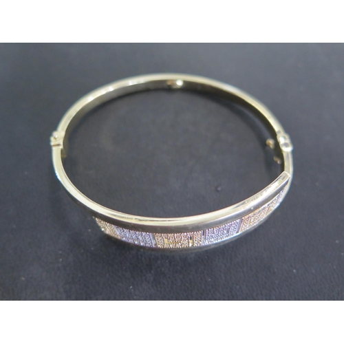 772 - A 14ct yellow gold bangle - approx weight 13.5 grams - Width 6.5cm x 6cm - marked AVORT TSE 585 - cl... 