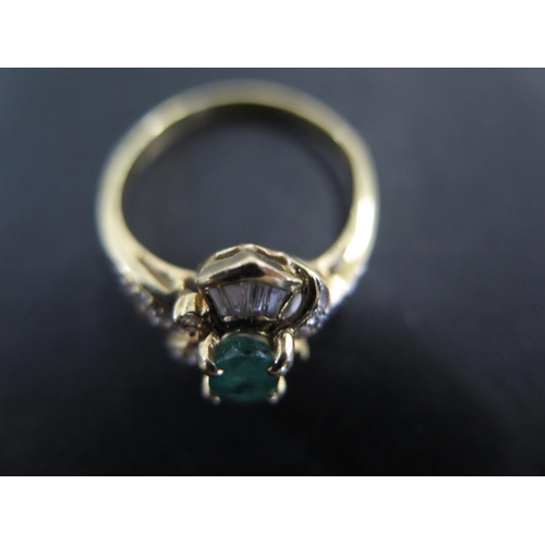 836 - An 18ct yellow gold emerald and baguette cut diamond ring size Q - approx weight 3.7 grams - light u... 