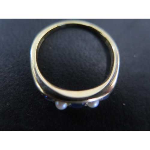 837 - An 18ct yellow gold sapphire and pearl ring size N - approx weight 4.2 grams - light usage wear