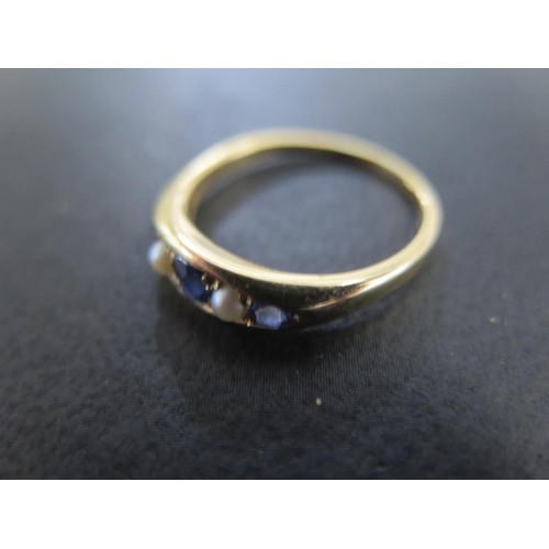 837 - An 18ct yellow gold sapphire and pearl ring size N - approx weight 4.2 grams - light usage wear