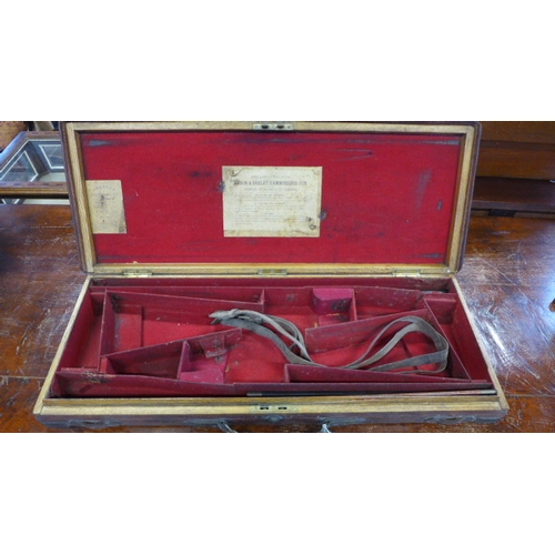 506 - A leather covered gun case used for a Anson & Deeley hammerless gun manufactured by Westly Richards ... 