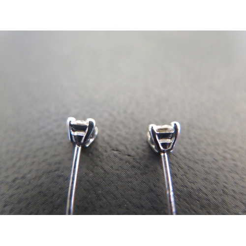 804 - A pair of 9ct white gold diamond stud earrings - total approx diamond weight 0.50ct - total weight a... 