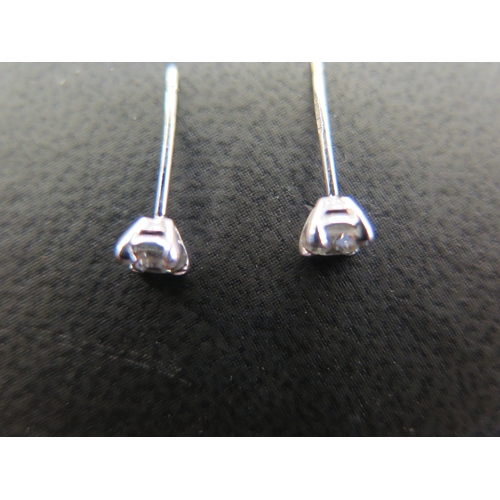 804 - A pair of 9ct white gold diamond stud earrings - total approx diamond weight 0.50ct - total weight a... 