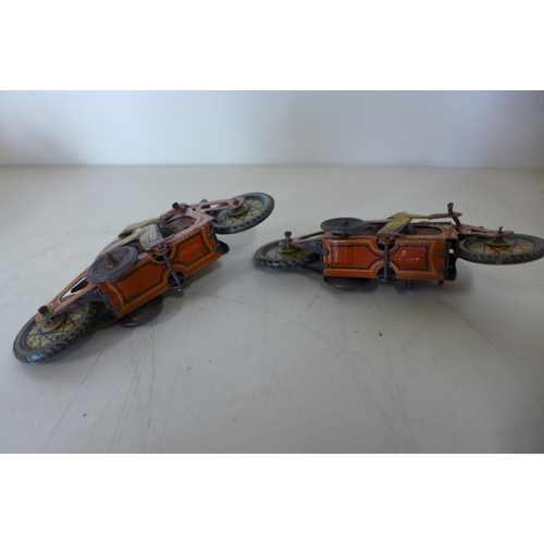 1151 - Two small tinplate clock work motorcycles 9cm long and two Dinky race cars - some play wear to all, ... 