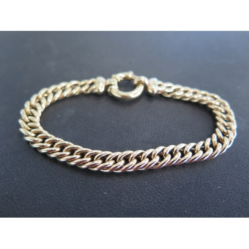 778 - A 9ct yellow gold bracelet of chain link form, hoop clasp - approx weight 14 grams