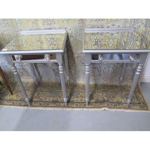 10 - A pair of painted hall tables with mirrored  tops - 54cm wide x 75cm high - in good condition