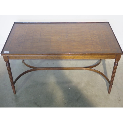 37 - A modern coffee table with  a burr walnut top 92cm x 52cm