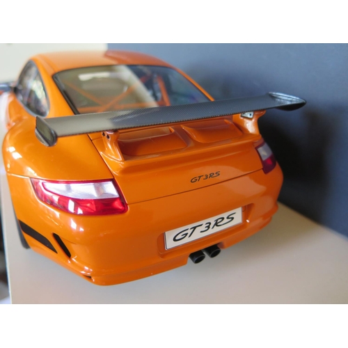 732 - An Autoart 1/12 scale, die-cast, Porsche 911 GT3 RS, with original box, model in as new condition bu... 