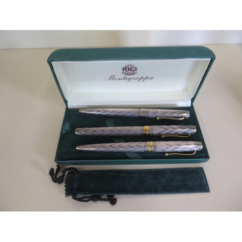 A Montegrappa 1055 VI 925 silver fountain pen and two 1055 VI