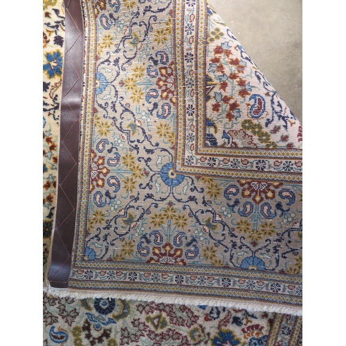 477 - A hand knotted Fine Kashan woollen rug - 2.23m x 1.40m