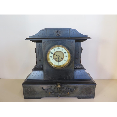 415 - A large Victorian black marble mantle clock, 45cm tall, 48cm wide, some small chips, ticks but stops