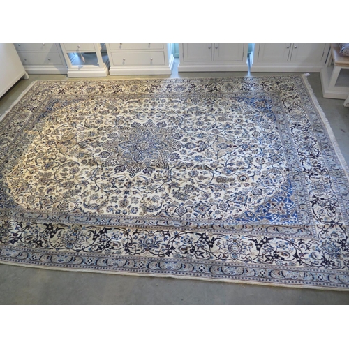 468 - A hand knotted woollen Fine Nain rug - 388cm x 291cm