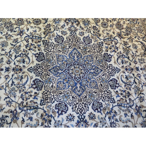 468 - A hand knotted woollen Fine Nain rug - 388cm x 291cm