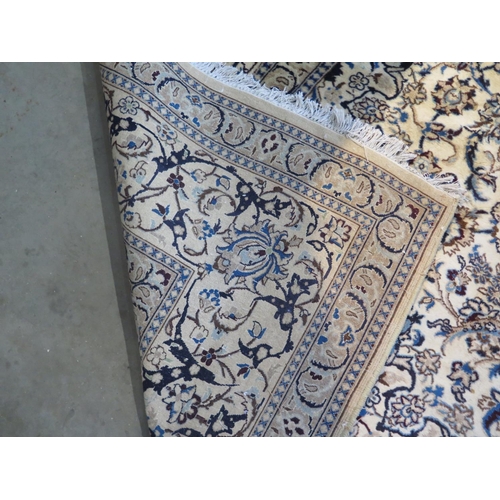 468 - A hand knotted woollen Fine Nain rug - 388cm x 291cm