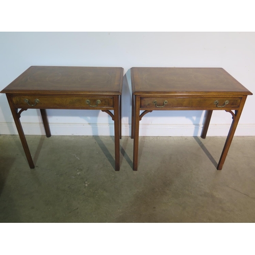 231 - A pair of walnut side tables each with a frieze drawer on square chamfered moulded legs, made by a l... 