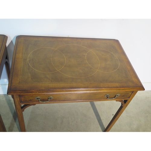 231 - A pair of walnut side tables each with a frieze drawer on square chamfered moulded legs, made by a l... 