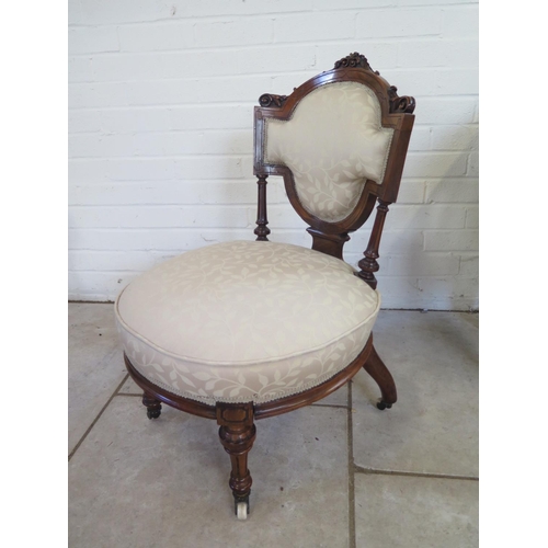 236 - A good quality Victorian walnut nursing chair, recently re-upholstered to a high standard