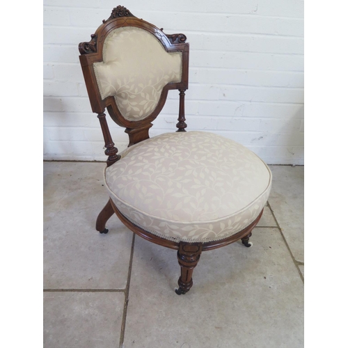 236 - A good quality Victorian walnut nursing chair, recently re-upholstered to a high standard