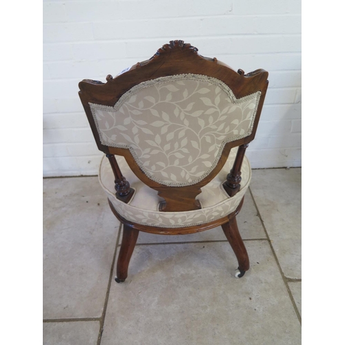 236 - A good quality Victorian walnut nursing chair, recently re-upholstered to a high standard