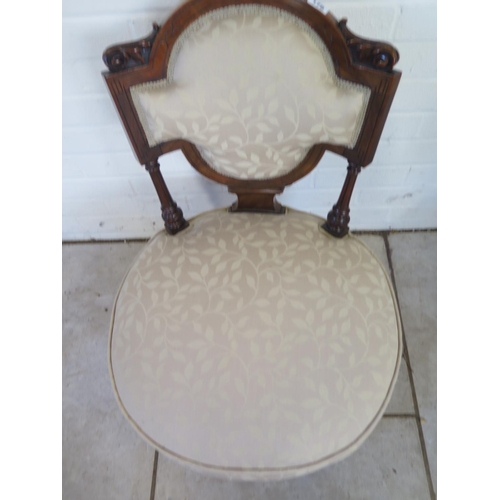 236 - A good quality Victorian walnut nursing chair, recently re-upholstered to a high standard