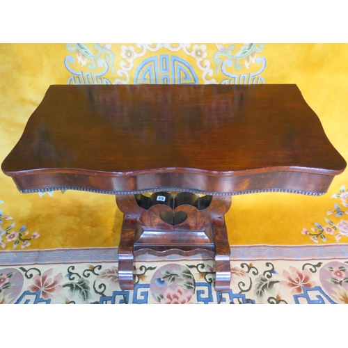 238 - A circa 1810 mahogany side table with top leaf on pivot for storage compartment, with Egyptian motif... 