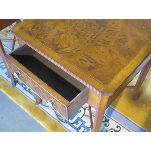 232 - A pair of walnut low side tables with a single drawer on splayed legs, united by stretchers, made by... 