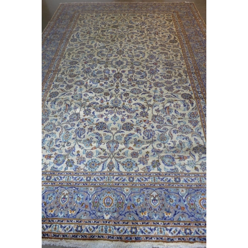 481 - A Kashan, hand knotted, woollen rug with caucasian ground, approximately 375cm x 275cm, some light w... 