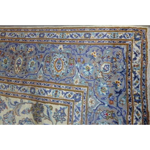 481 - A Kashan, hand knotted, woollen rug with caucasian ground, approximately 375cm x 275cm, some light w... 